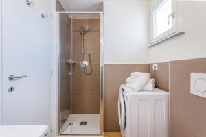 Ένα μπάνιο στο Corso Adriano 13 - I Portici