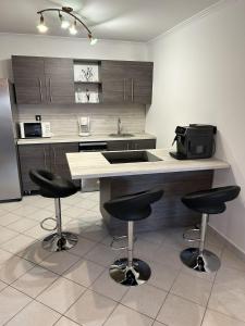 Kuchyň nebo kuchyňský kout v ubytování Hegyalja Apartmanház