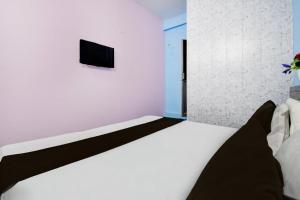 Ένα ή περισσότερα κρεβάτια σε δωμάτιο στο Hotel O Aashirwad Banquet And Restaurant +21 φωτογραφίες