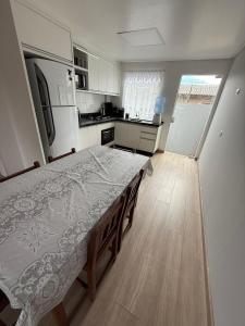 Kuchyň nebo kuchyňský kout v ubytování Hospedagem da Marli Bombinhas