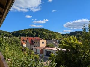 a view of a town with mountains in the background at Villa Viola in Breitenstein