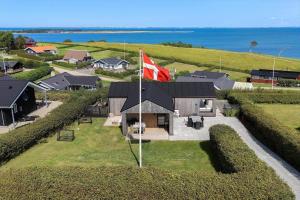 an aerial view of a house with a canadian flag at G322-Lemvig-Gyvelvej-22 in Lemvig
