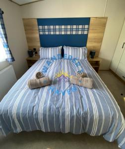 Ένα ή περισσότερα κρεβάτια σε δωμάτιο στο Wanderers Haven, Brigham, Cockermouth, Cumbria