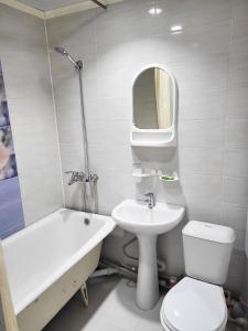 Koupelna v ubytování Владимирская 2а