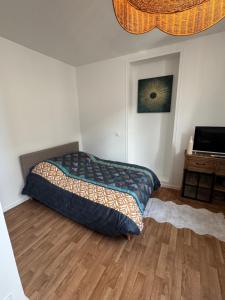 Postel nebo postele na pokoji v ubytování Studio Pensée - Proche centre ville
