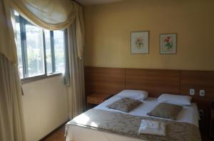 Katil atau katil-katil dalam bilik di Rhud's Hotel +64 gambar