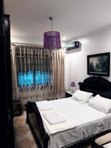 Ένα ή περισσότερα κρεβάτια σε δωμάτιο στο CasaVini