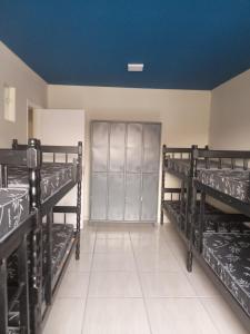 Voodi või voodid majutusasutuse Sheymar Hostel Pindamonhangaba toas