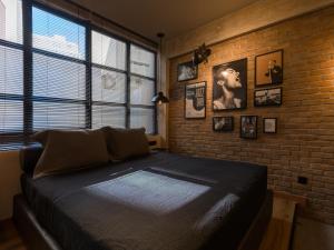 Ένα ή περισσότερα κρεβάτια σε δωμάτιο στο City Plus by CityBee