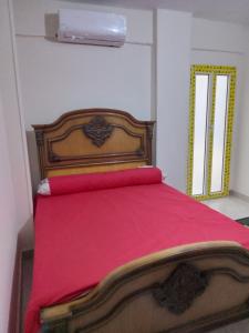 Ένα ή περισσότερα κρεβάτια σε δωμάτιο στο Near Pyramids Apartment +5 φωτογραφίες