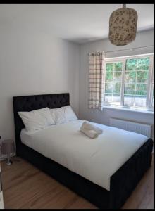 Ένα ή περισσότερα κρεβάτια σε δωμάτιο στο Folkstone Luxury Lodge 40 percent off with Garage and Driveway