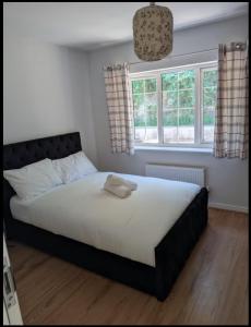 Ένα ή περισσότερα κρεβάτια σε δωμάτιο στο Folkstone Luxury Lodge 40 percent off with Garage and Driveway +16 φωτογραφίες