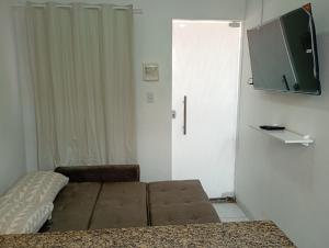 Televisyen dan/atau pusat hiburan di Apartamento Completo e Centralizado 5
