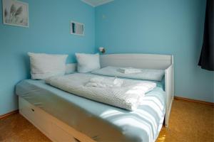 Postel nebo postele na pokoji v ubytování Sinfonie + 26 fotografií