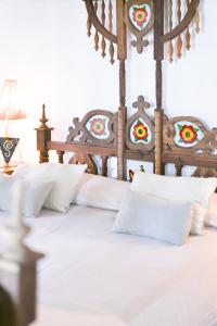 Katil atau katil-katil dalam bilik di Appartamento La Bandita Agriturismo Montechiaro