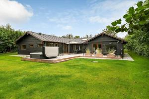 Zahrada ubytování BV403-Blavand-Lyngsletten-31