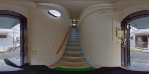 a hallway with a staircase in a building at ゲストハウス栄 in Tokyo +52 photos