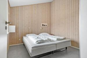 Ένα ή περισσότερα κρεβάτια σε δωμάτιο στο 2261-Ringkobing-Klitsvinget-36