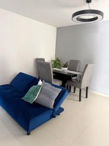 Ruang duduk di Cómodo departamento