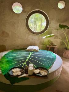 Ένα ή περισσότερα κρεβάτια σε δωμάτιο στο Casa caracol Macario