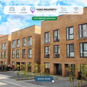 a website of a brick building with a sign that reads yoda property at 4 Bedroom 3 Bathroom House - Sleeps up to 8 - City Centre - Free Parking, Fast Wifi, Private Garden and Smart TV by Yoko Property in Milton Keynes