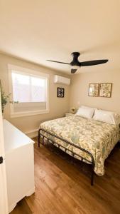 Ένα ή περισσότερα κρεβάτια σε δωμάτιο στο Bonifacio Oasis