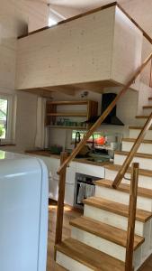 a staircase in a tiny house at Ferienhaus Stade in Stade