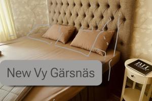 Postel nebo postele na pokoji v ubytování New VY Gärsnäs 1