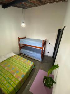 Ένα ή περισσότερα κρεβάτια σε δωμάτιο στο Apartmento com vista pro mar Praia das Dunas