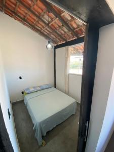 Ένα ή περισσότερα κρεβάτια σε δωμάτιο στο Apartmento com vista pro mar Praia das Dunas