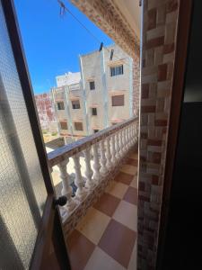 a view from the door of a balcony at VERSE 5 min de la playa in Riffiene +1 photo