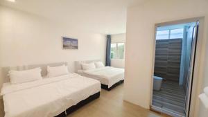 Postel nebo postele na pokoji v ubytování Town city 3 Bedroom Apartment