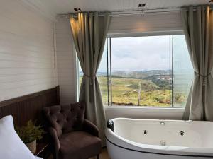 Fotografie z fotogalerie ubytování Cabana premium com hidromassagem e vista para o pôr-do-sol v destinaci São Joaquim + 58 fotografií