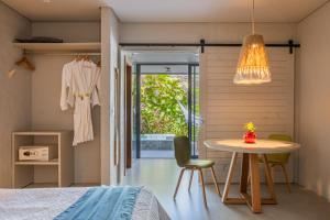 Postel nebo postele na pokoji v ubytování Saline Taíba Boutique Beach Hotel