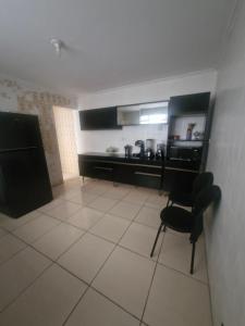 Η κουζίνα ή μικρή κουζίνα στο Aurora três +11 φωτογραφίες