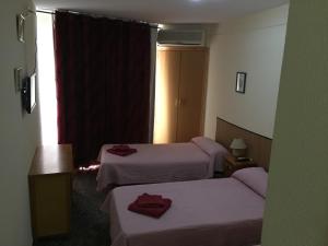 Postel nebo postele na pokoji v ubytování Hostal L'Escaleta