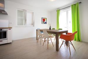 Kuchyň nebo kuchyňský kout v ubytování Apartments Tamburini