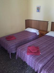 Postel nebo postele na pokoji v ubytování Hostal L'Escaleta