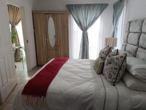 Postel nebo postele na pokoji v ubytování Long on Hill