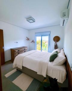 Ένα ή περισσότερα κρεβάτια σε δωμάτιο στο Juquehy - Duplex in prime area 1 block from the beach
