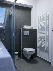 Koupelna v ubytování Primera Apartments