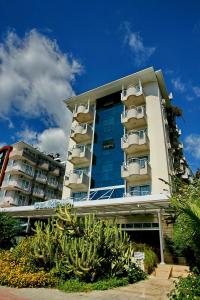 a building with balconies on the side of it at Kleopatra Celine Hotel in Alanya