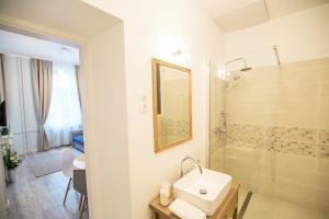 Koupelna v ubytování Eden Center Home + 27 fotografií