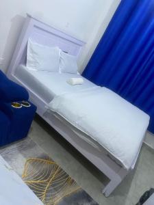 Postel nebo postele na pokoji v ubytování Royal suburbs by Tsavo