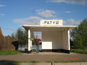 a man standing in the entrance to a parking lot at Ratusha Hall Zazymje in Dobrovelychkivka