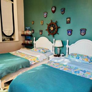 Una cama o camas en una habitación de Shihualou