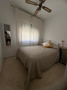 Una cama o camas en una habitación de Brisas de Las Piletas