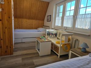 Postel nebo postele na pokoji v ubytování Dirks Baum-Haus