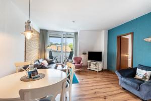 TV a/nebo společenská místnost v ubytování Kajüthus Apartment 3