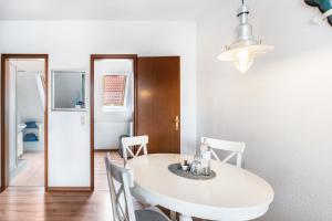 Kuchyň nebo kuchyňský kout v ubytování Kajüthus Apartment 3 + 10 fotografií